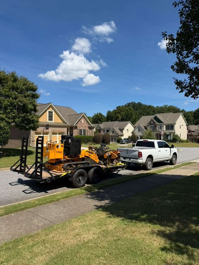 ML Stump Removal equipment arriving at a residential project